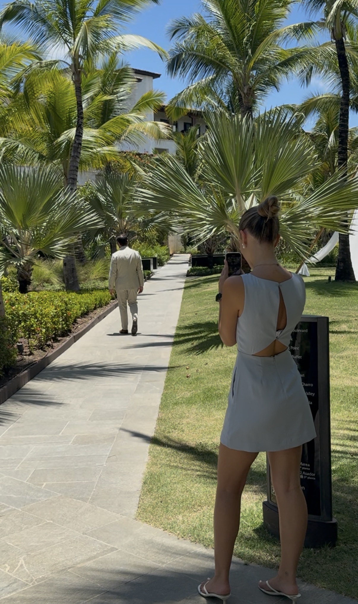 Content creator filming at a destination wedding